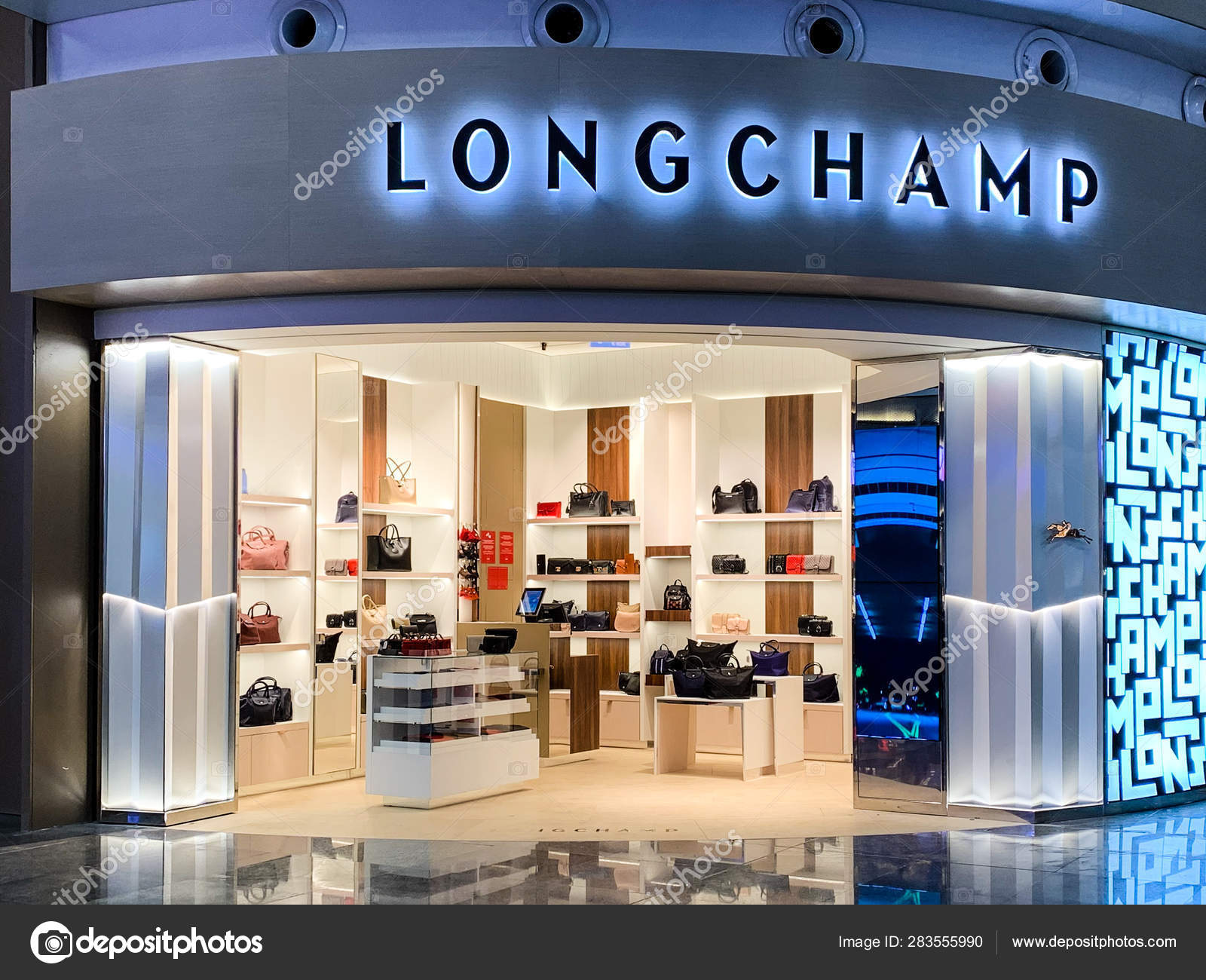 Longchamp shop in a mall. Longchamp is 
