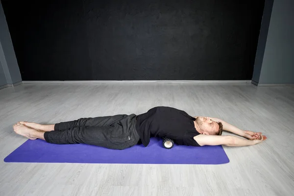 Young Athletic Man Working Out His Spine Muscles Roller — Stock Photo, Image