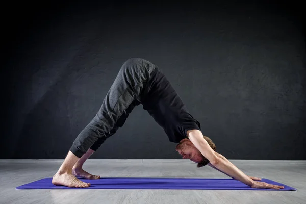 Young Man Stretching Gym Practising Yoga Positions — Stock Photo, Image