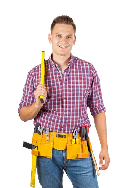 Joven Reparador Sosteniendo Nivel Espíritu Sonriendo Cámara Sobre Fondo Aislado — Foto de Stock