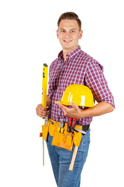 有吸引力的年轻修理工与黄色头盔和工具带在孤立的背景下 — 图库照片