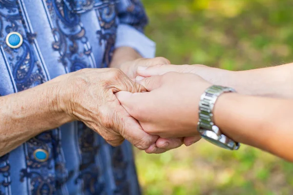 Close Picture Young Woman Holding Her Senior Grandmother Wrinkled Hands — Stock Photo, Image