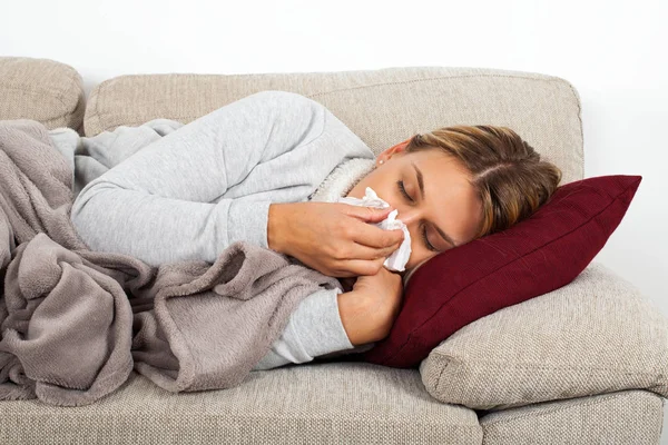 Sick Woman Lying Sofa Blowing Her Nose Sinus Infection — Stock Photo, Image