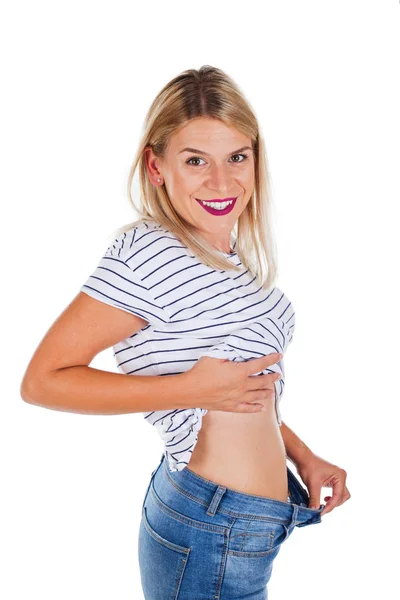 Sexy Jonge Vrouw Gelukkig Voor Haar Gewichtsverlies Geïsoleerde Achtergrond — Stockfoto