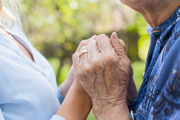Close Picture Worried Elderly Woman Holding Young Woman Hands — Stock Photo, Image