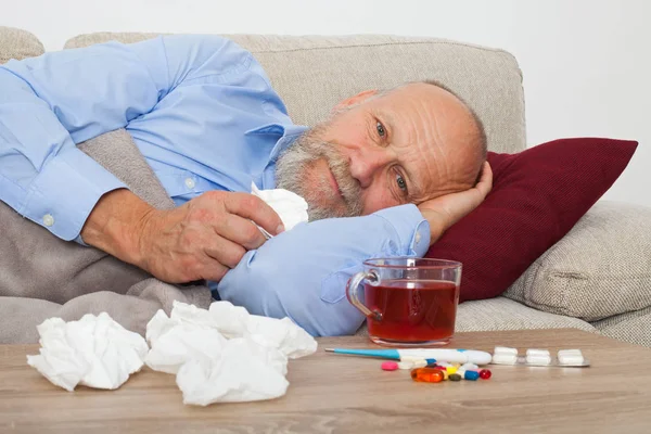 Sick Senior Male Patient Lying Couch Home — Stock Photo, Image