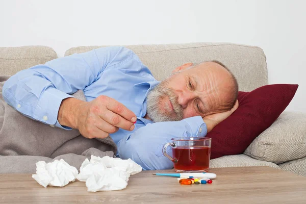 Sick Senior Male Patient Lying Couch Home — Stock Photo, Image