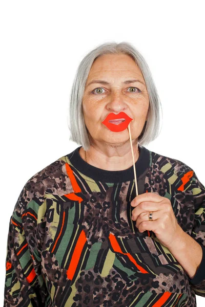 Senior Woman Holding Red Kissing Lips Isolated Background Photo Booth — Stock Photo, Image