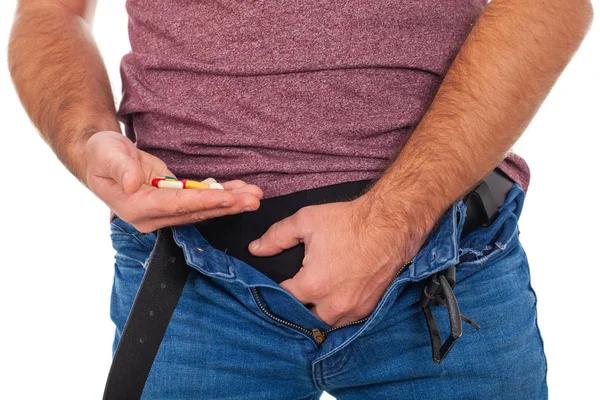 Imagem Perto Virilha Homem Com Jeans Descompactados Segurando Pílulas Potência — Fotografia de Stock