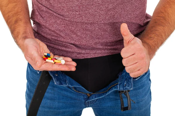 Imagem Perto Virilha Homem Com Jeans Descompactados Segurando Pílulas Potência — Fotografia de Stock