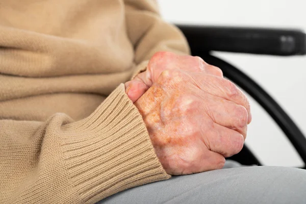 Elderly shaking hands — Stock Photo, Image