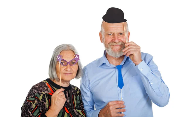 Пожилая пара с фотоаксессуарами — стоковое фото