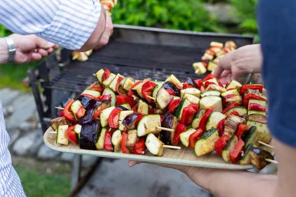 Grilling vegetables on skewers outdoor — Stock Photo, Image