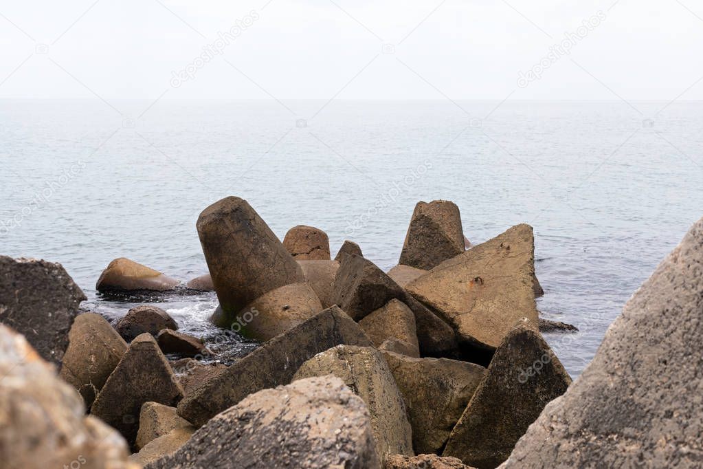 Rocky clay cliffs at the beach