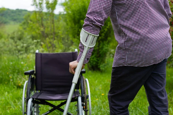 Senior men holding  assistive cane — Stock Photo, Image
