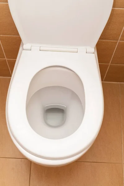 Toilet bowl at a bathroom Stock Photo