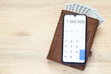 Organizatör bizimle dollarsr ve açık hesap makinesi ile numaralarını 1 000 000 arka planda bir resepsiyon ile kopyalama alanı 