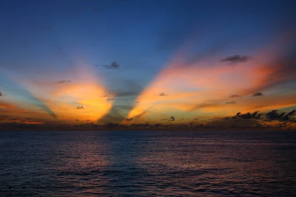 sunrise with clouds on the ocean