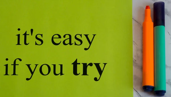 It's easy if you try. Motivation. Actions. Success. Creativity. Black words on a green background. Color marker. Art. Study. — Stock Photo, Image