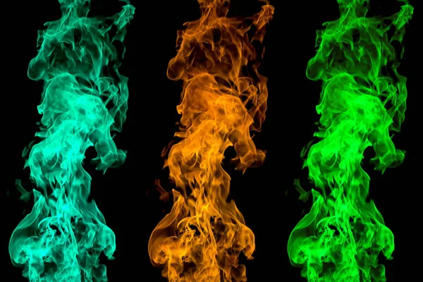 Colored fire on black background. Flaming patterns and abstract smoke. Concept, idea, project.