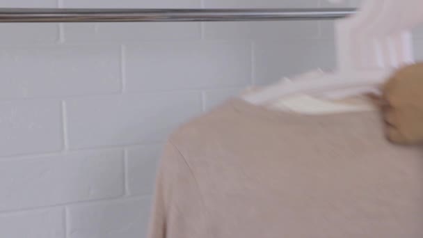 Women Clothing Hanger Nude Wardrobe Capsule Wardrobe Take Hangers Clothes — Stock Video