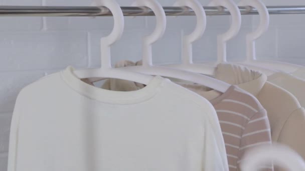 Woman Takes Clothes Hanger Buy Women Clothing Collect Clothes Trip — Stock Video