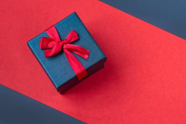gift box on red background.background for Valentines day and for the eighth March