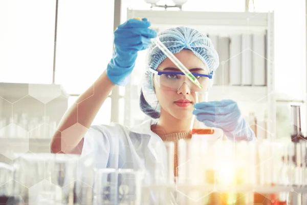 female scientists are experimenting in lab room