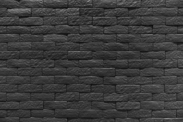 Черная Кирпичная Стена Темного Камня — стоковое фото