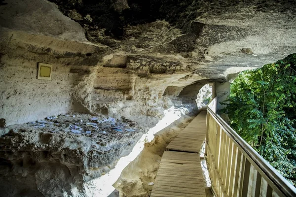 Kind on internal maintenance the second level of rocky monastery. Place for a dream in monastic monastic cell.