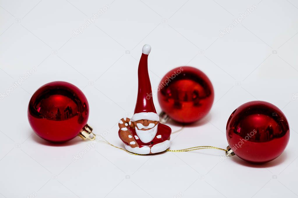 Christmas decorations in red on a light background