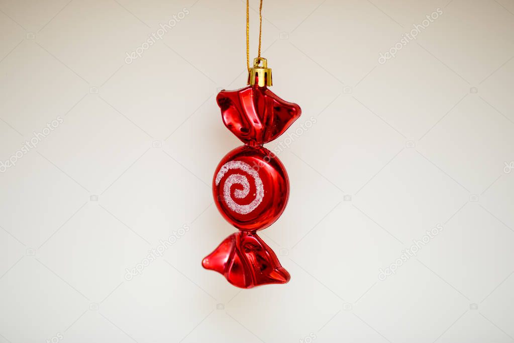 Christmas decorations in red on a light background