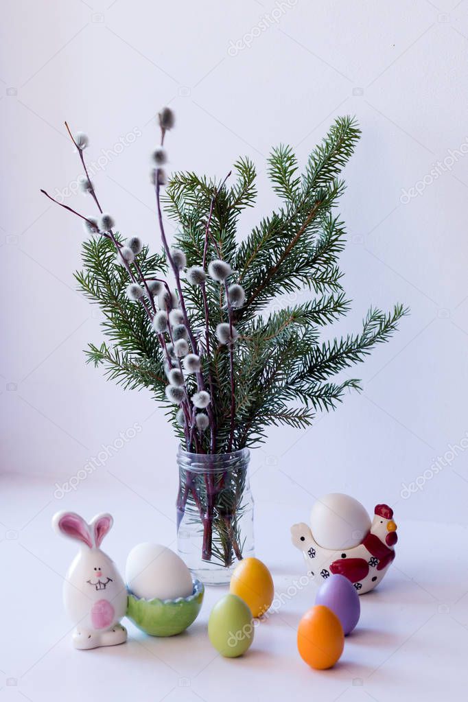 Easter composition: eggs and a bouquet of willow