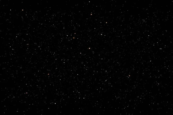 Stars in the night sky background texture milky way glow of stars. The sky is in the stars.