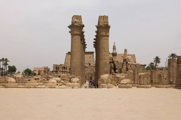 Buildings and columns of ancient Egyptian megaliths. Ancient ruins of Egyptian buildings