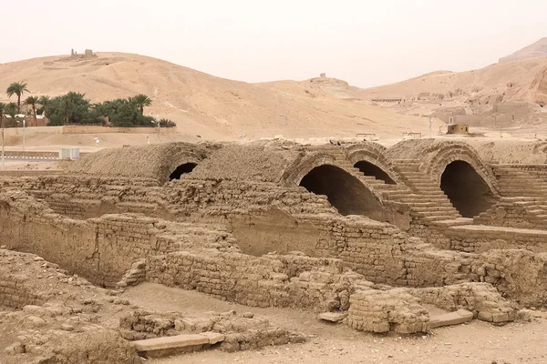 Buildings and columns of ancient Egyptian megaliths. Ancient ruins of Egyptian buildings