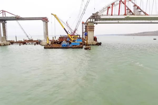 Construction of the bridge. Engineering facilities for the construction of a railway and automobile bridge across the strait.