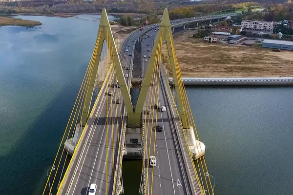 Beautiful bridge over the river. The bridge on the cables is road.