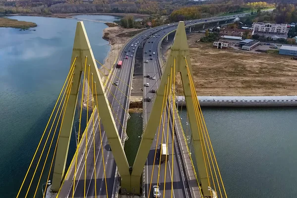 Beautiful bridge over the river. The bridge on the cables is road.