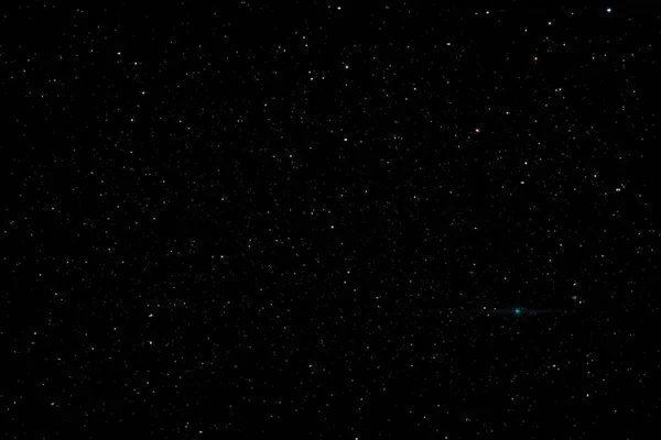 Stars in the night sky background texture milky way glow of stars. The sky is in the stars.