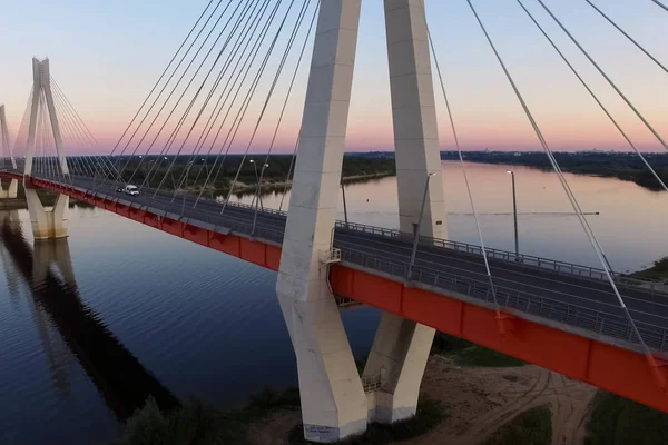 Beautiful bridge over the river. The bridge on the cables is road.