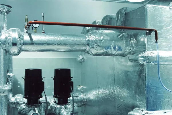 Thermal insulation of a pipes with foil.