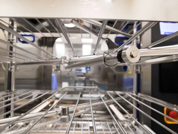 CLOSEUP IMAGE OF SPRAY HEADER ROOF OF WASHER DISINFECTOR