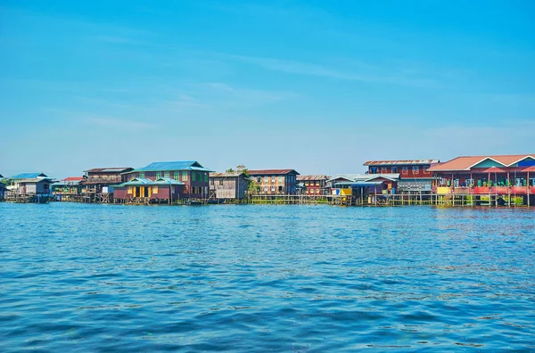 The old wooden stilt houses of Intha village, located on Inle Lake and popular among tourists, Myanmar.