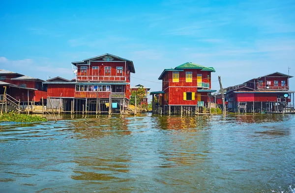 Inle Lake is the place of location of numerous villages with wooden stilt houses, locals specialize in fishing, lotus growing and different authentic handicrafts, Inpawkhon, Myanmar.