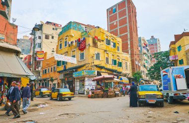 Alexandria, Mısır - 18 Aralık 2017: Karmouz bölgesinde eski pazar - squae üzerinde 18 Aralık Alexandria dükkanlar, tezgahları ve bağlıyordun, çevrilidir.