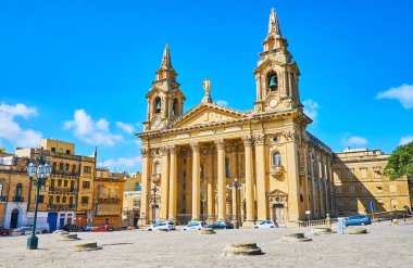 The ancient Il-Fosos area (Granaries) in front of magnificent St Publius Church with Neoclassical portico and tall bell towers, Floriana, Malta. clipart