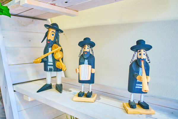 The small figurines of jewish hasidic musicians are the fine souvenirs from Kazimierz neighborhood in Krakow, Poland