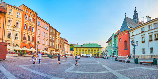 KRAKOW, POLAND - JUNE 11, 2018: Little Market Square (Maly Rynek) is less crowded and more cozy for spending evening than neighboring Main Market, on June 11 in Krakow