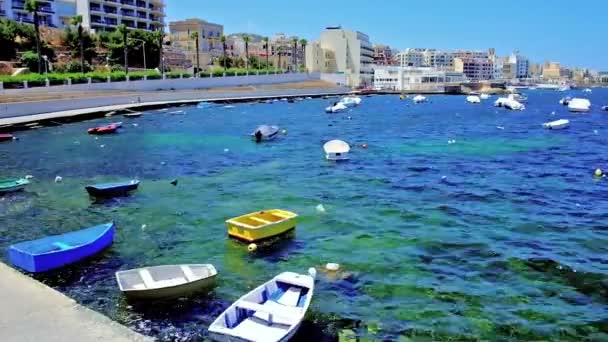 Colorful Wooden Dinghies Rocking Waves Shore Paul Bay Bugibba Malta — Stock Video